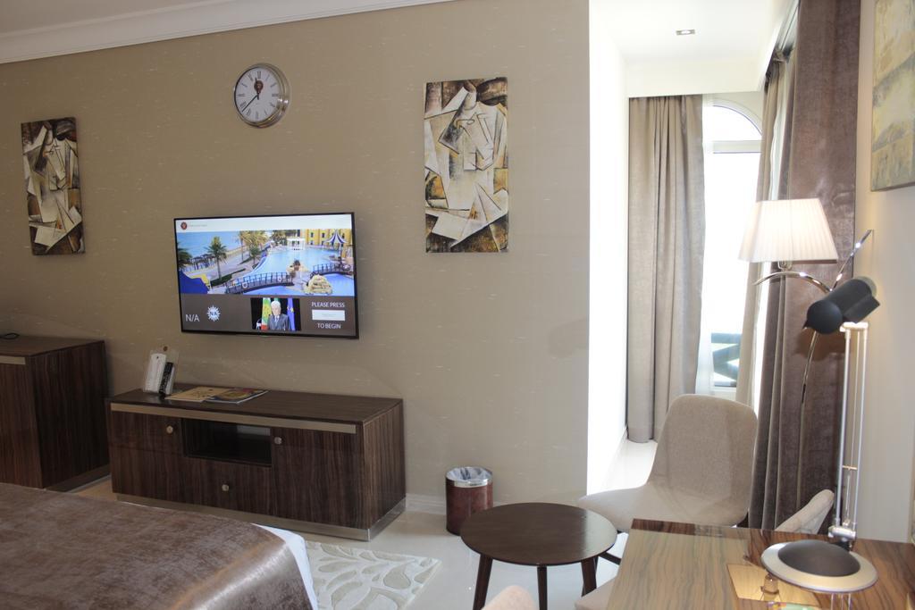 Tio Sea Resort Al Khor Exteriör bild A room at the hotel
