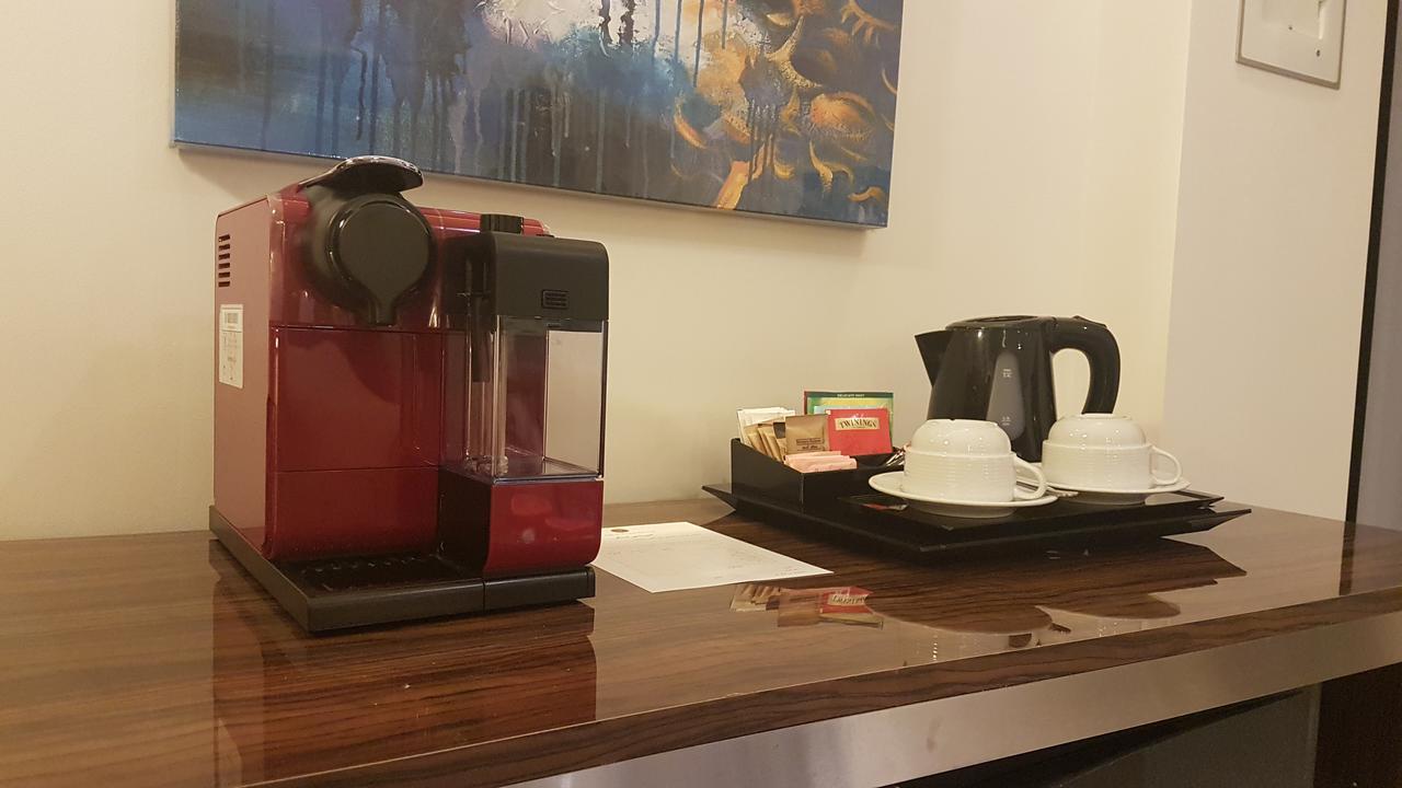 Tio Sea Resort Al Khor Exteriör bild A Nespresso coffee machine in a hotel room
